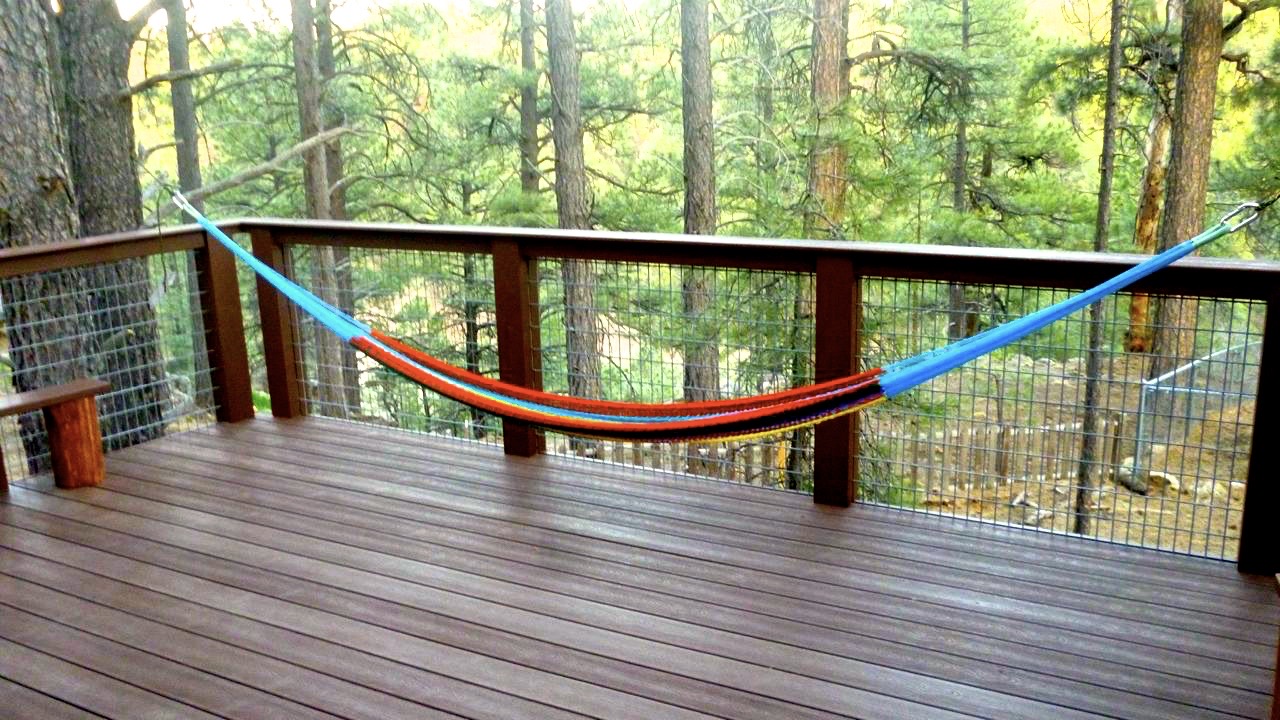 Hammock on cabin deck in the pines